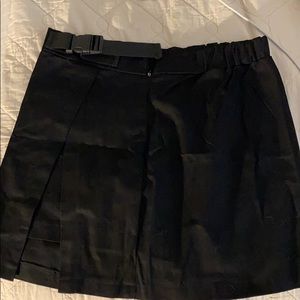 black skirt with slit in front with buckle